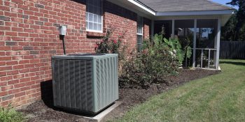 Air Conditioner System Next To A Home