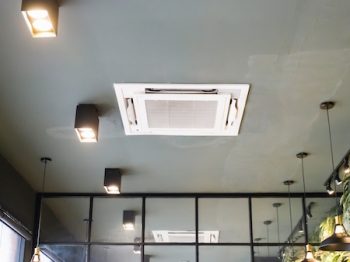Modern Ceiling Mounted Cassette Type Air Conditioning System In Coffee Shop
