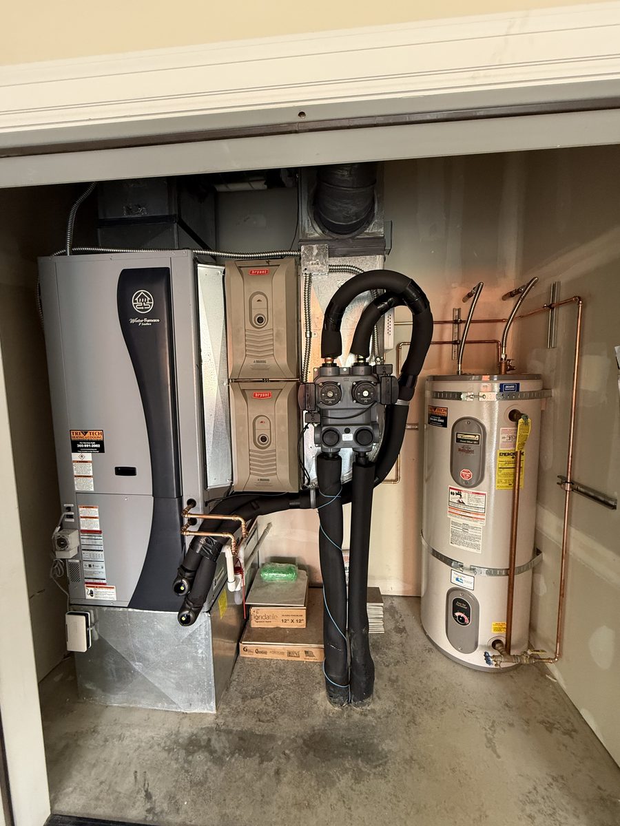 Geothermal heat pump with ground-loop flow center installed in a Vancouver WA home by Tri-Tech Heating, Inc.