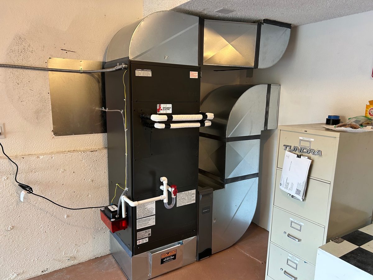 Heat pump air handler installation Heat pump air handler with new ductwork installed by Tri-Tech Heating, Inc.