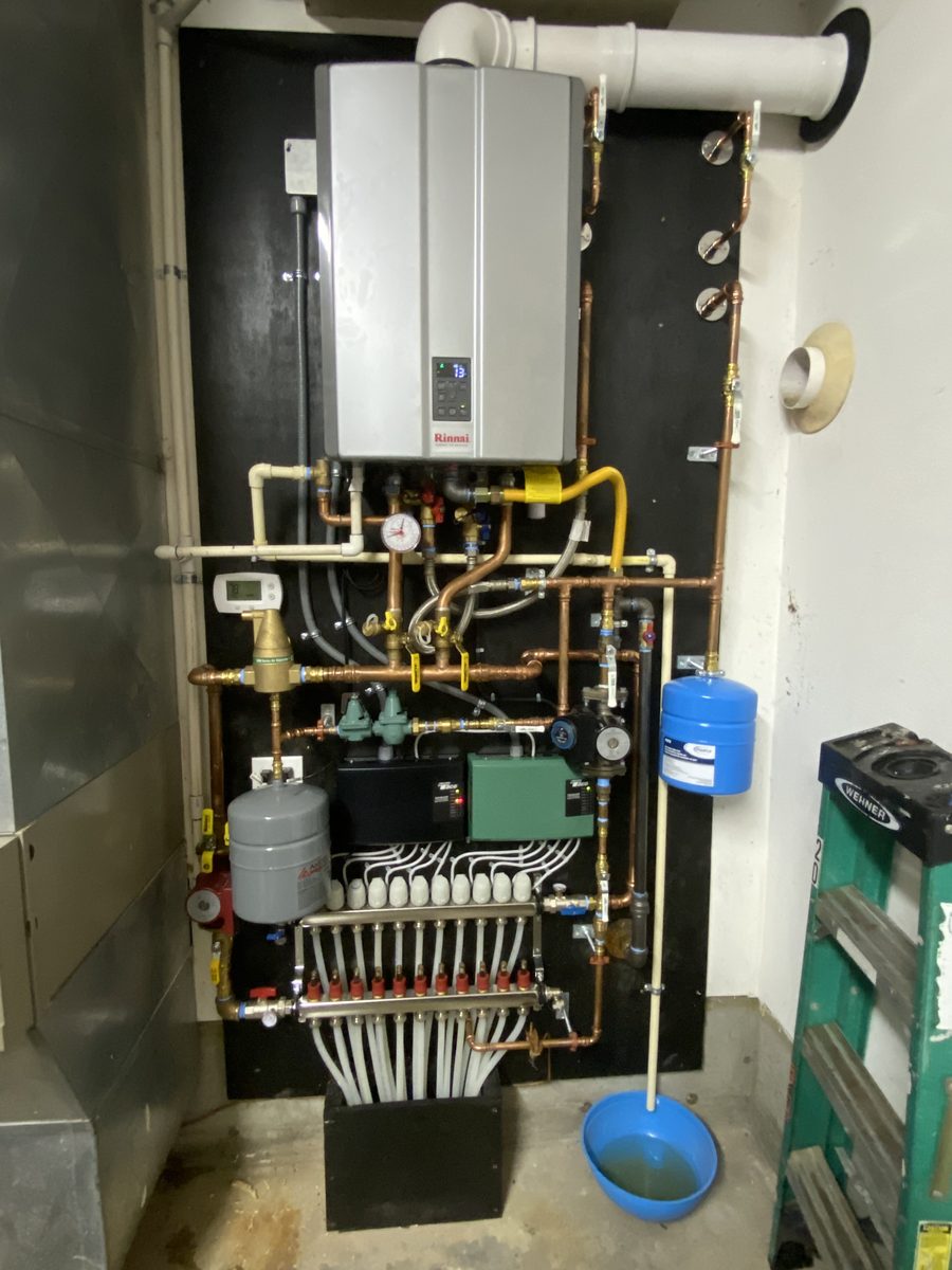 Hydronic boiler and radiant manifold High-efficiency gas boiler with radiant heating manifold, circulator pumps and zone controls